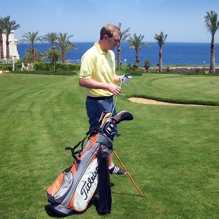 Stella Di Mare Beach Hotel & Spa Sharm El-Sheikh Exterior foto Golf player with a golf bag