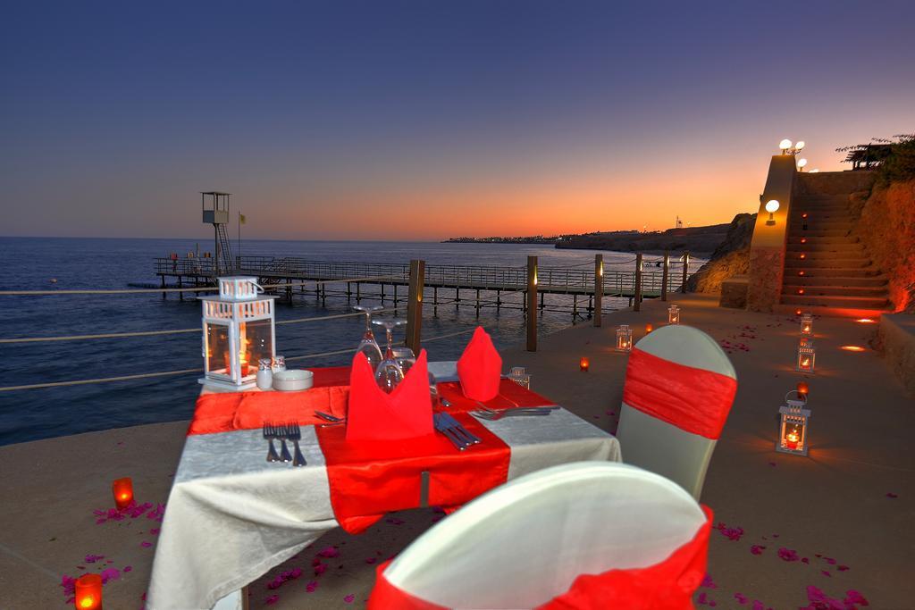 Stella Di Mare Beach Hotel & Spa Sharm El-Sheikh Exterior foto Sunset at the Fort